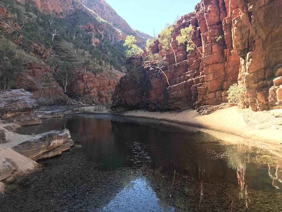 Billabong (waterhole) surrounded by rock walls