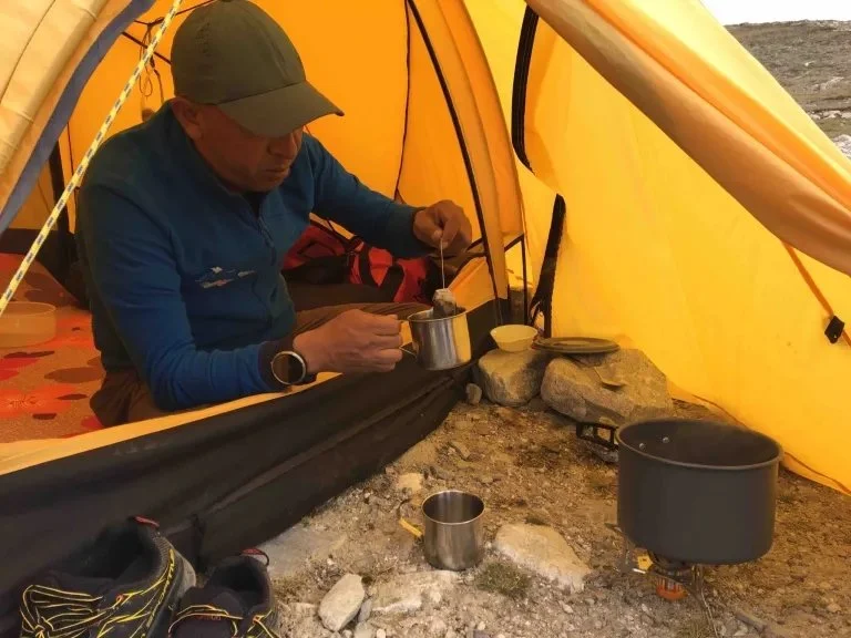 Mingma making tea at Intermediate camp