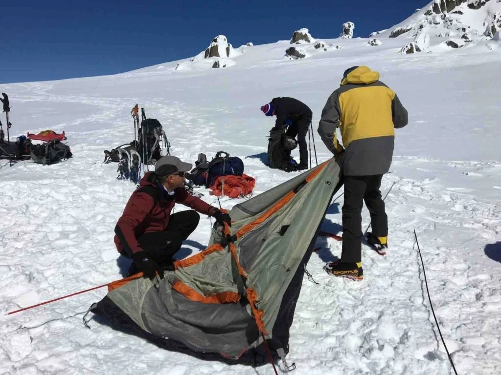 Pitching our tent in the snow