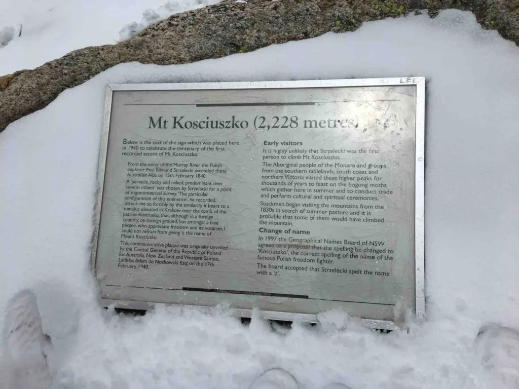 The sign at the summit of Mt Kosciuszko which shows the altitude of 2,228m