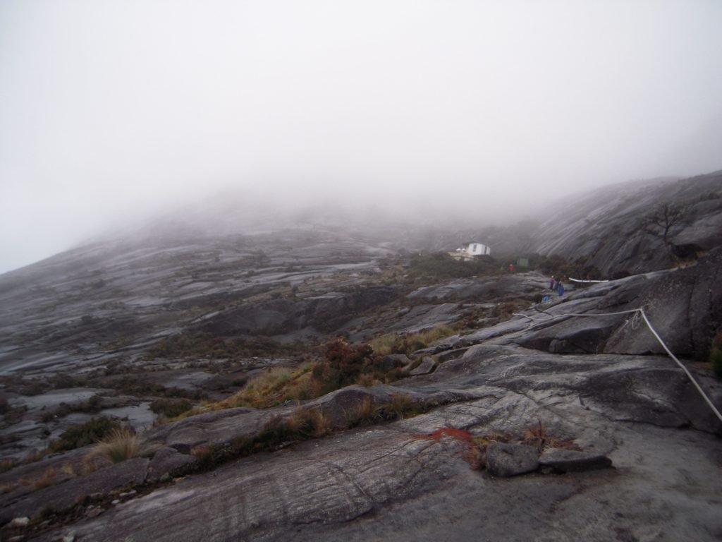 a granite slope leading into the clouds