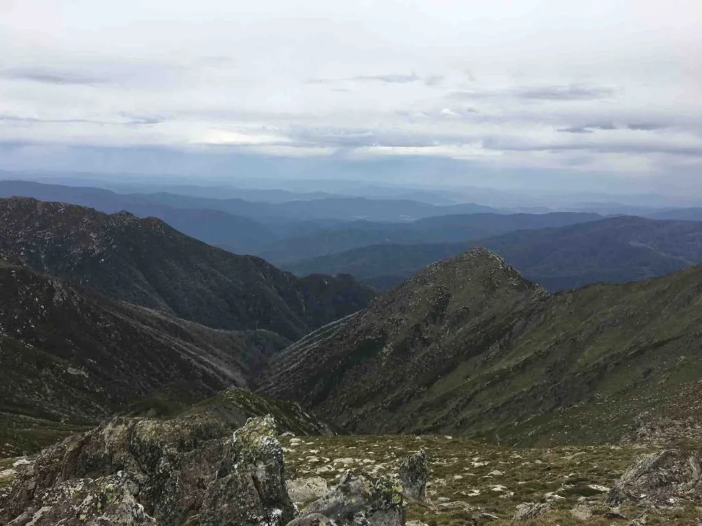 View west across Kosciuszko National Park looking at distant mountain ranges