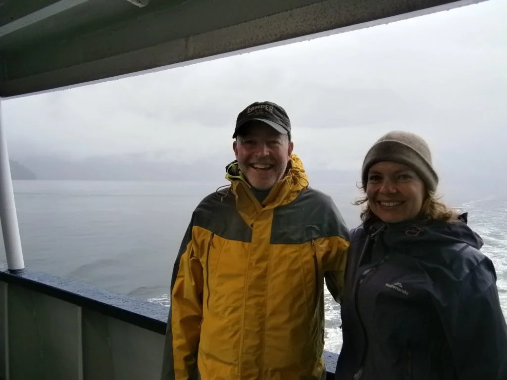 Emma and Trevor wearing their lucky raincoats