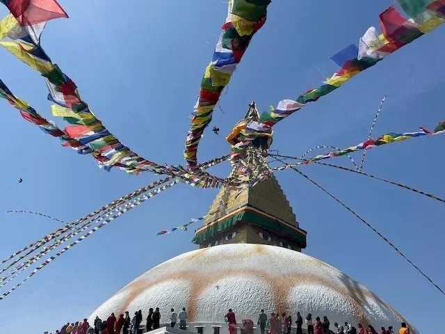 Boudhanath Stupa with prayer flags fluttering