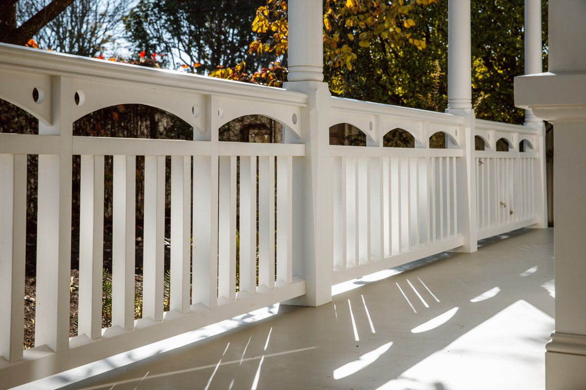 Restored heritage balustrade and verandah detailing on a character home renovation in Narrow Neck, Auckland.