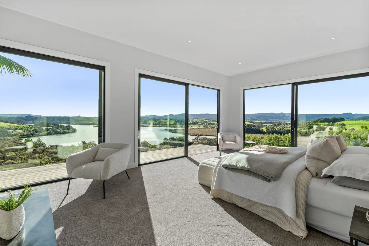 coast-and-country-homes-matakana-bedroom-water-views.jpg