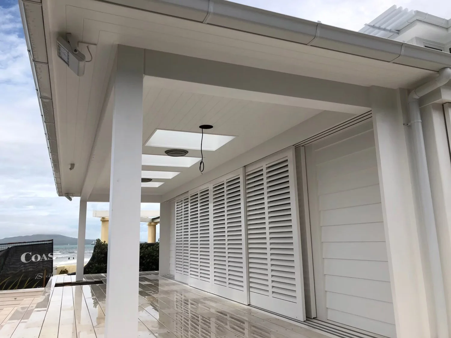 Side elevation of Milford villa extension showing integration with existing home