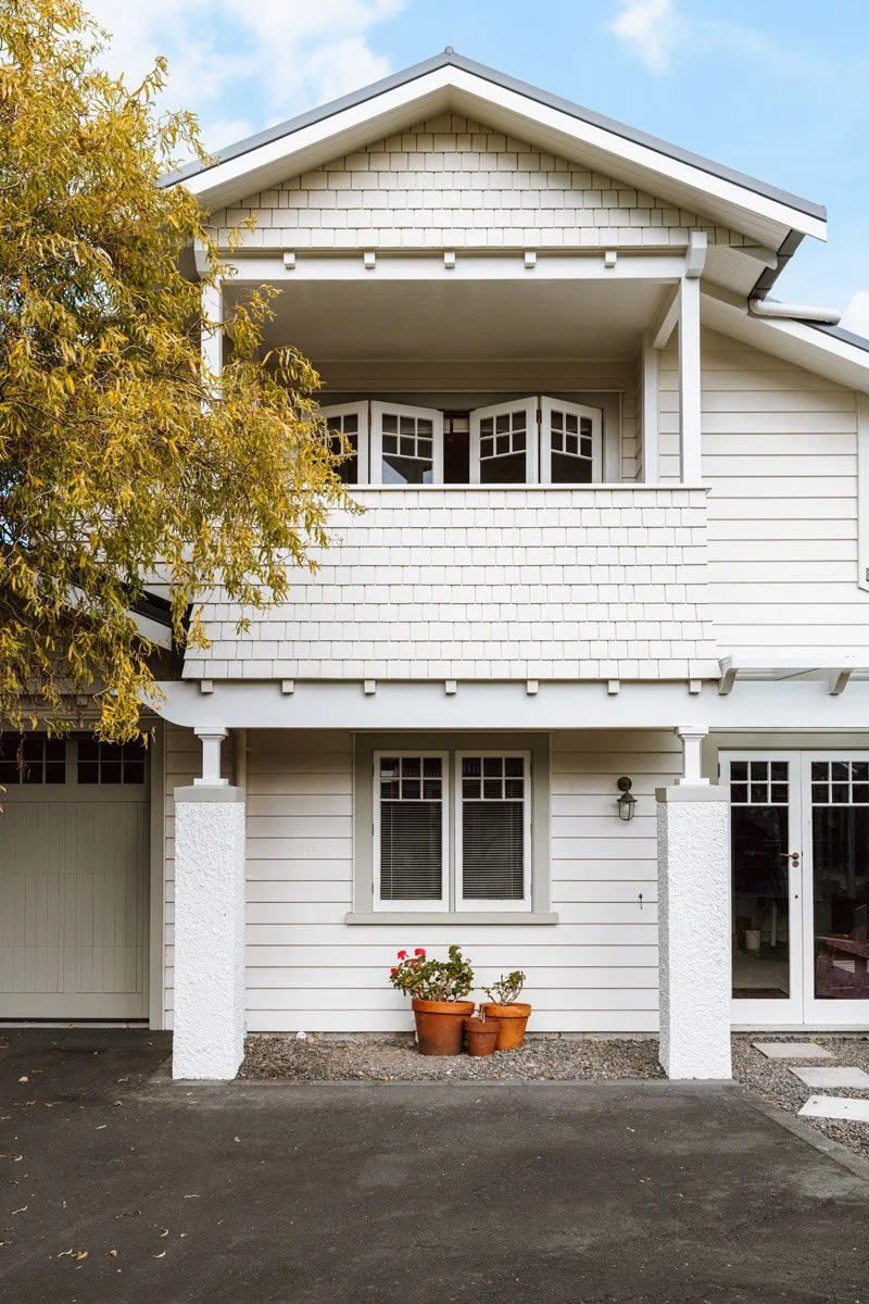 Heritage-style garage and upper-level addition designed to complement the original character home.