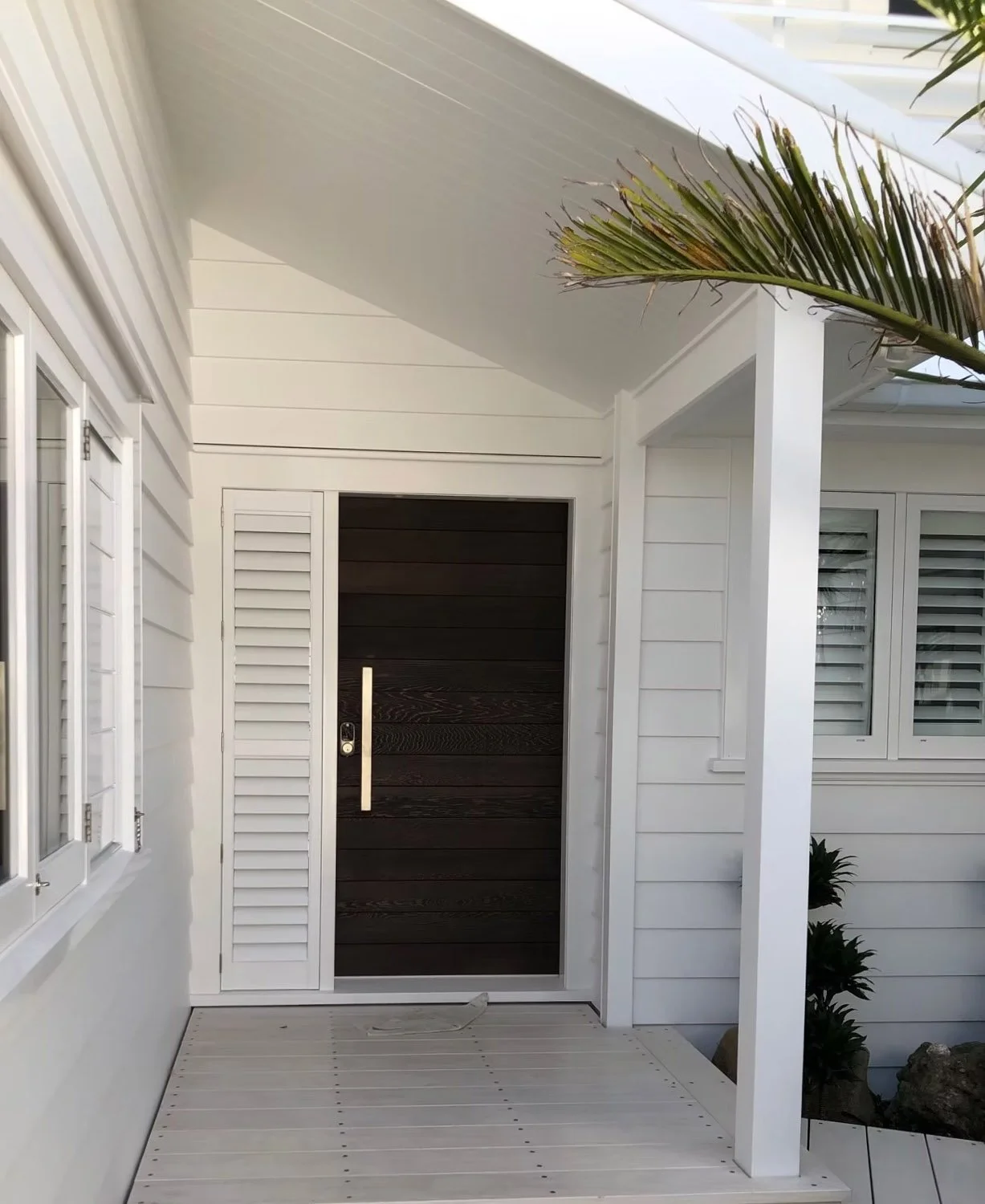 Weatherboard cladding detail on restored Milford villa Auckland
