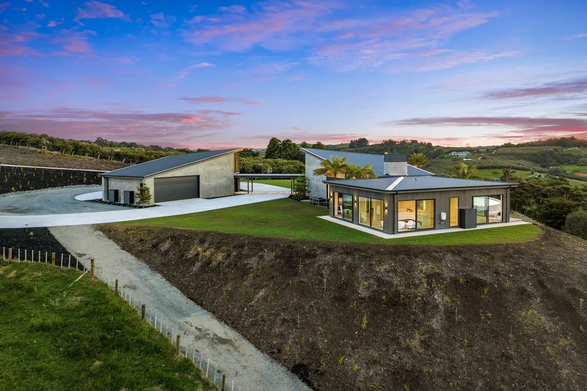 Rolling rural landscape and waterways surrounding Matakana property