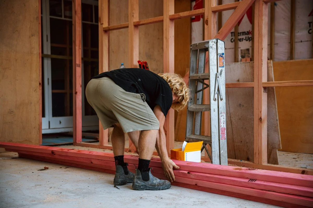 Interior framing and renovation work underway inside a character home restoration project in Devonport.