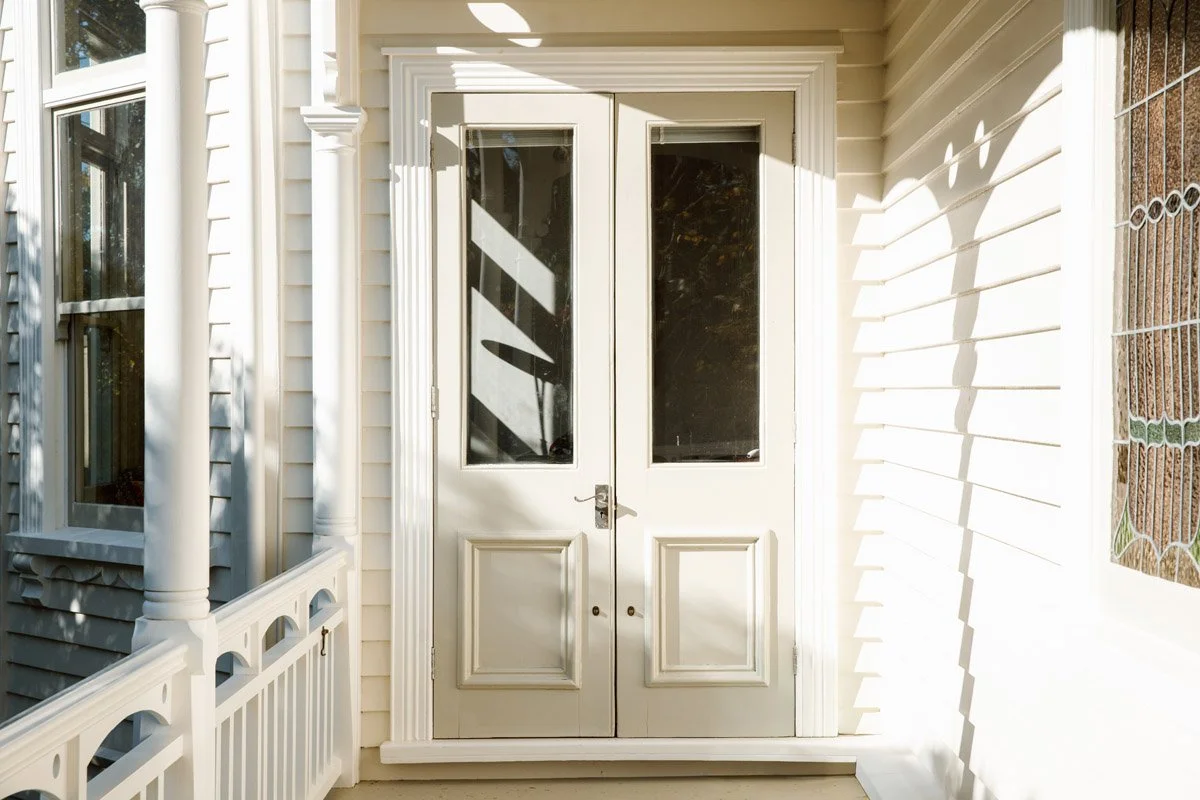 Traditional entrance verandah featuring restored timber joinery and heritage detailing at a character home renovation in Narrow Neck.