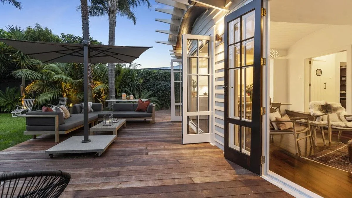 Timber deck and outdoor entertaining area connecting seamlessly to interior living spaces
