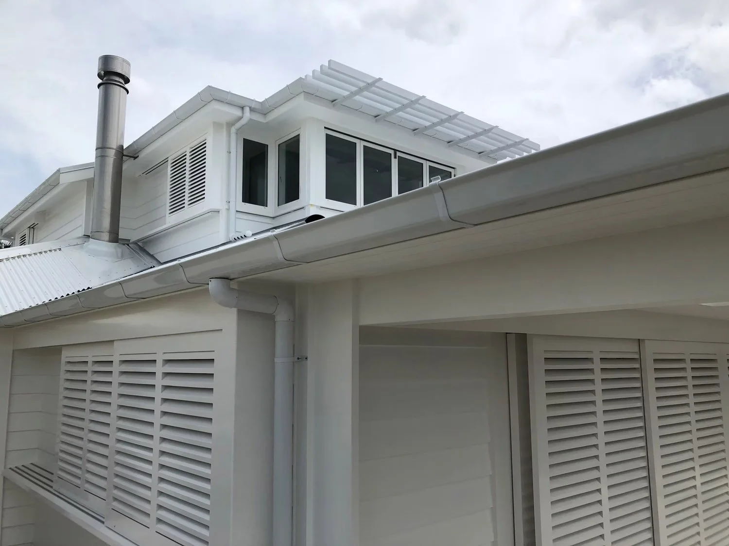 Timber louvre facade detail on Milford beachfront villa renovation Auckland