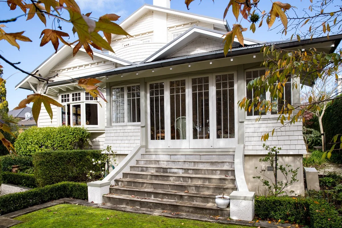 Renovated heritage home with restored timber joinery and landscaped gardens in Hauraki.