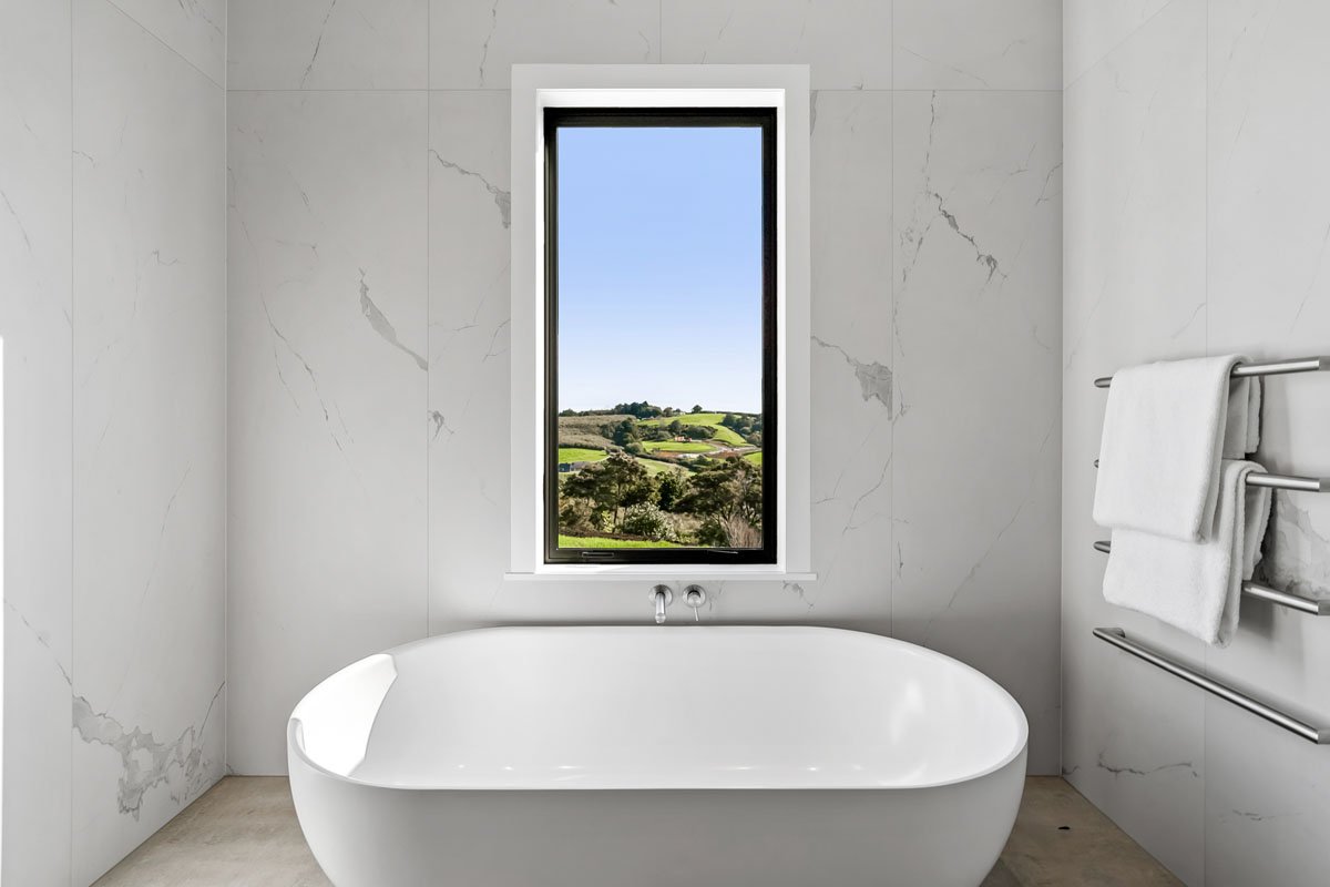 freestanding-bathroom-auckland-modern-home-tub-window-view.jpg