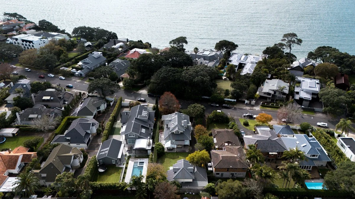 Aerial view of a renovated character home in Hauraki, Auckland, positioned within a premium coastal neighbourhood near the waterfront.