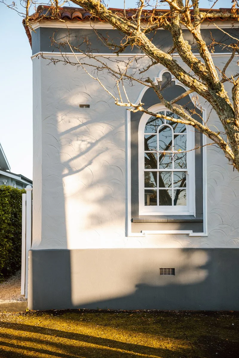 Original arched window detail restored during a Cheltenham character home renovation and restoration.