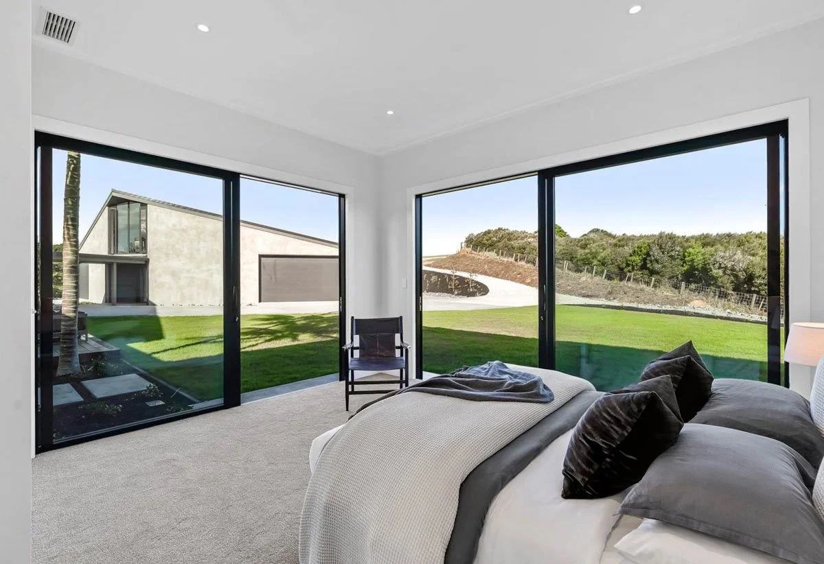 coast-and-country-homes-matakana-architectural-home-aerial-roof-view.jpg