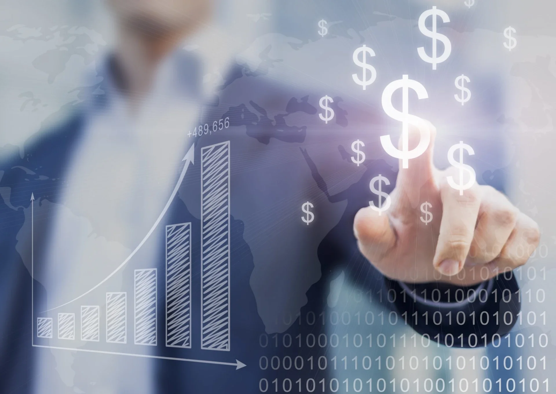 Business person in a suit pointing at a transparent digital overlay showing a world map, dollar signs, a rising bar graph, and binary code.