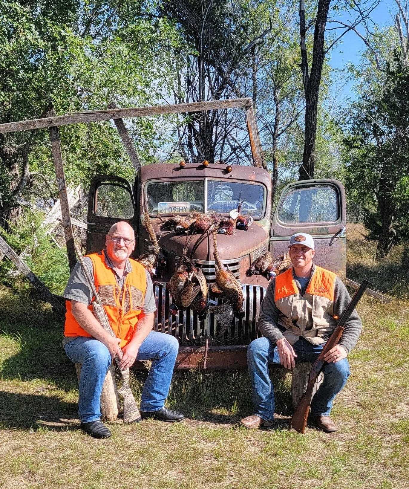 Randy Decker pheasant hunting with son, Clint. South Dakota