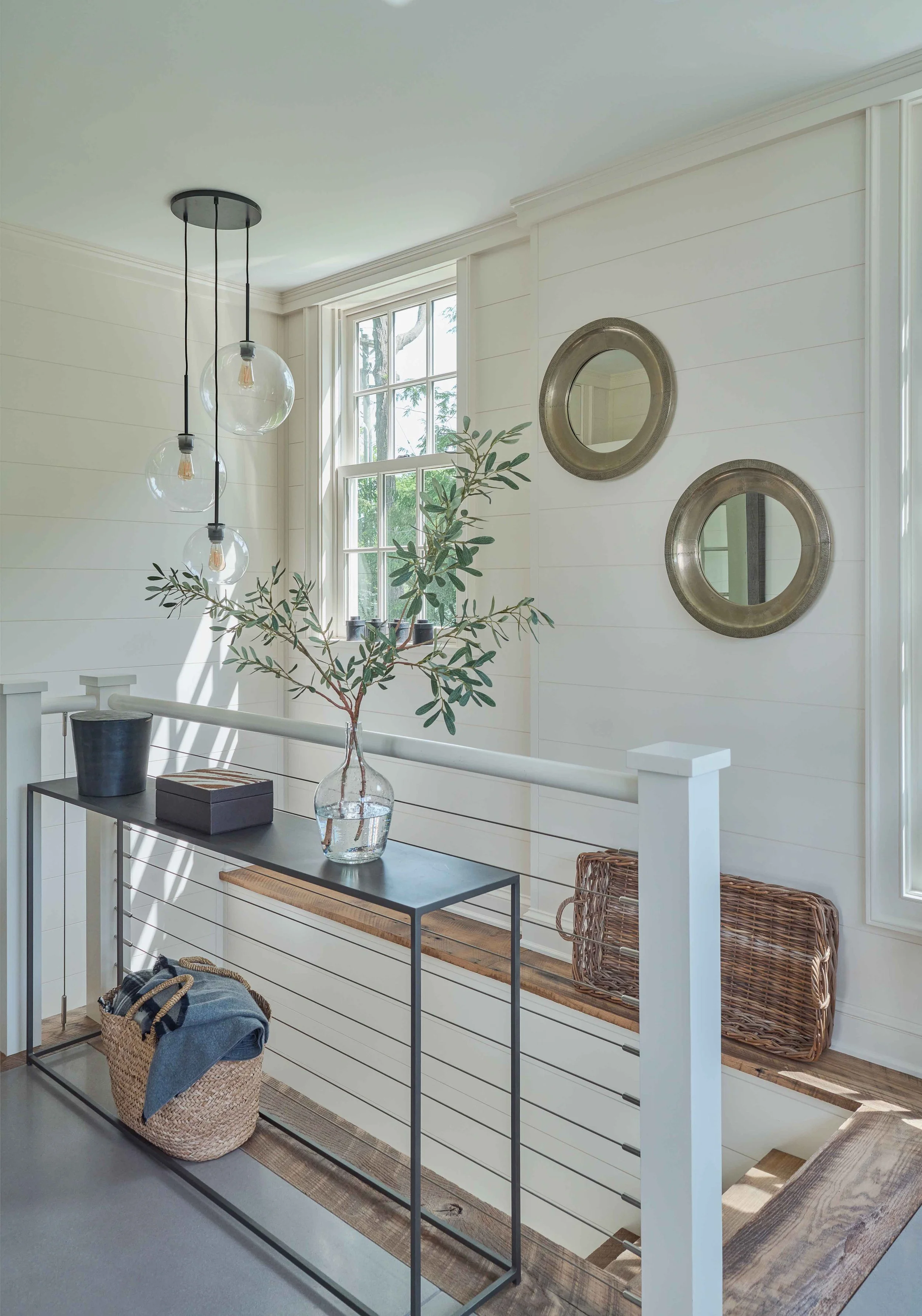 03-bedford-village-mudroom-stair-hall-connection-natural-light.jpg