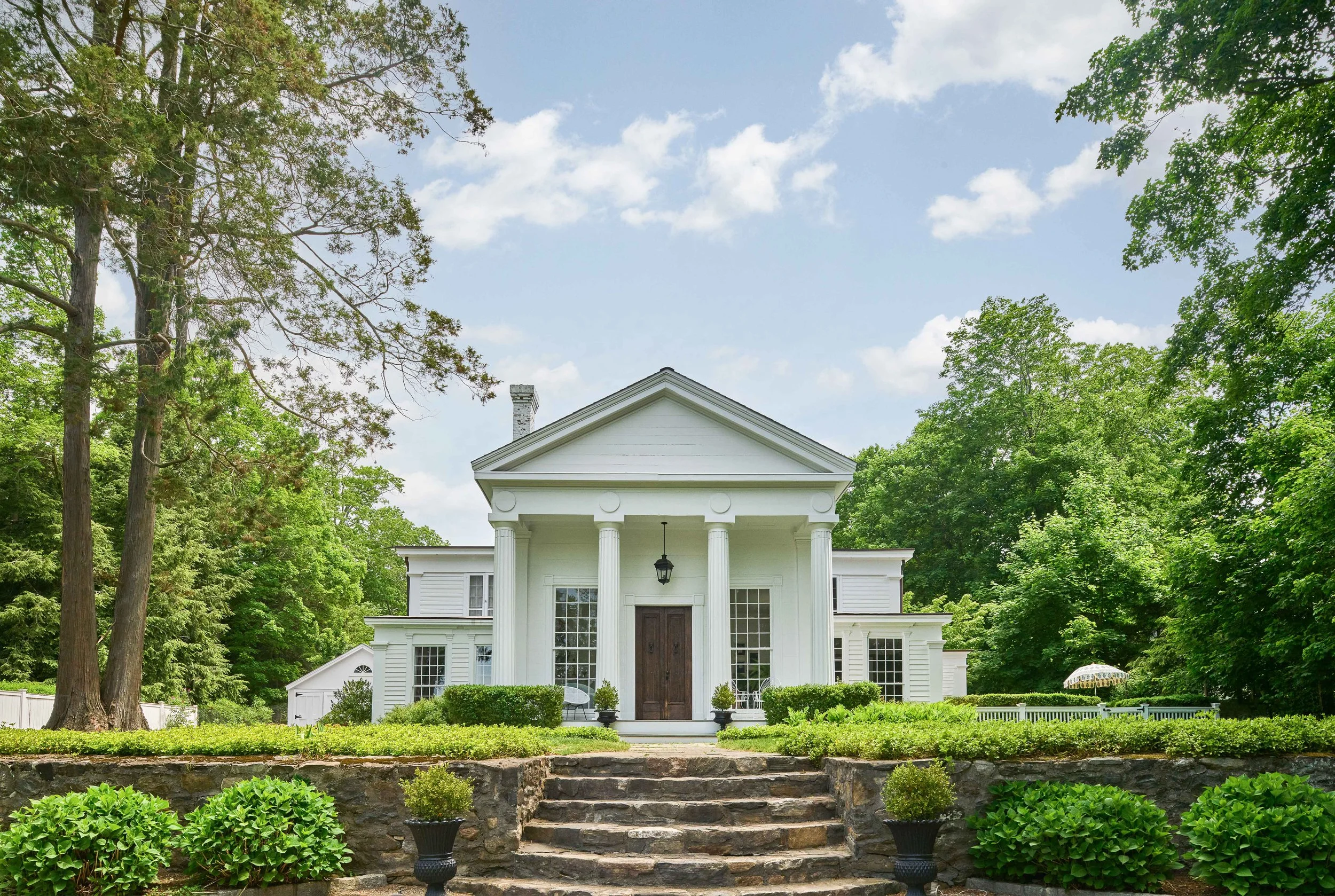 01-bedford-ny-greek-revival-front-exterior-symmetrical-facade.jpg