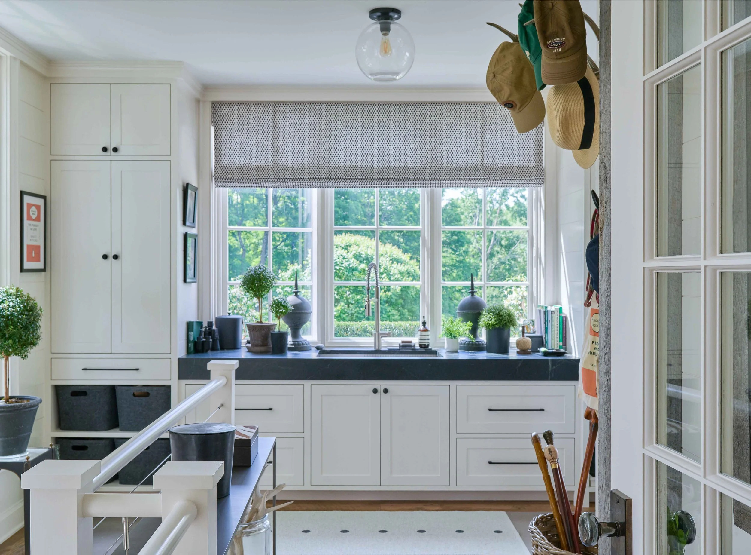 02-bedford-village-mudroom-soapstone-sink-window-storage.jpg