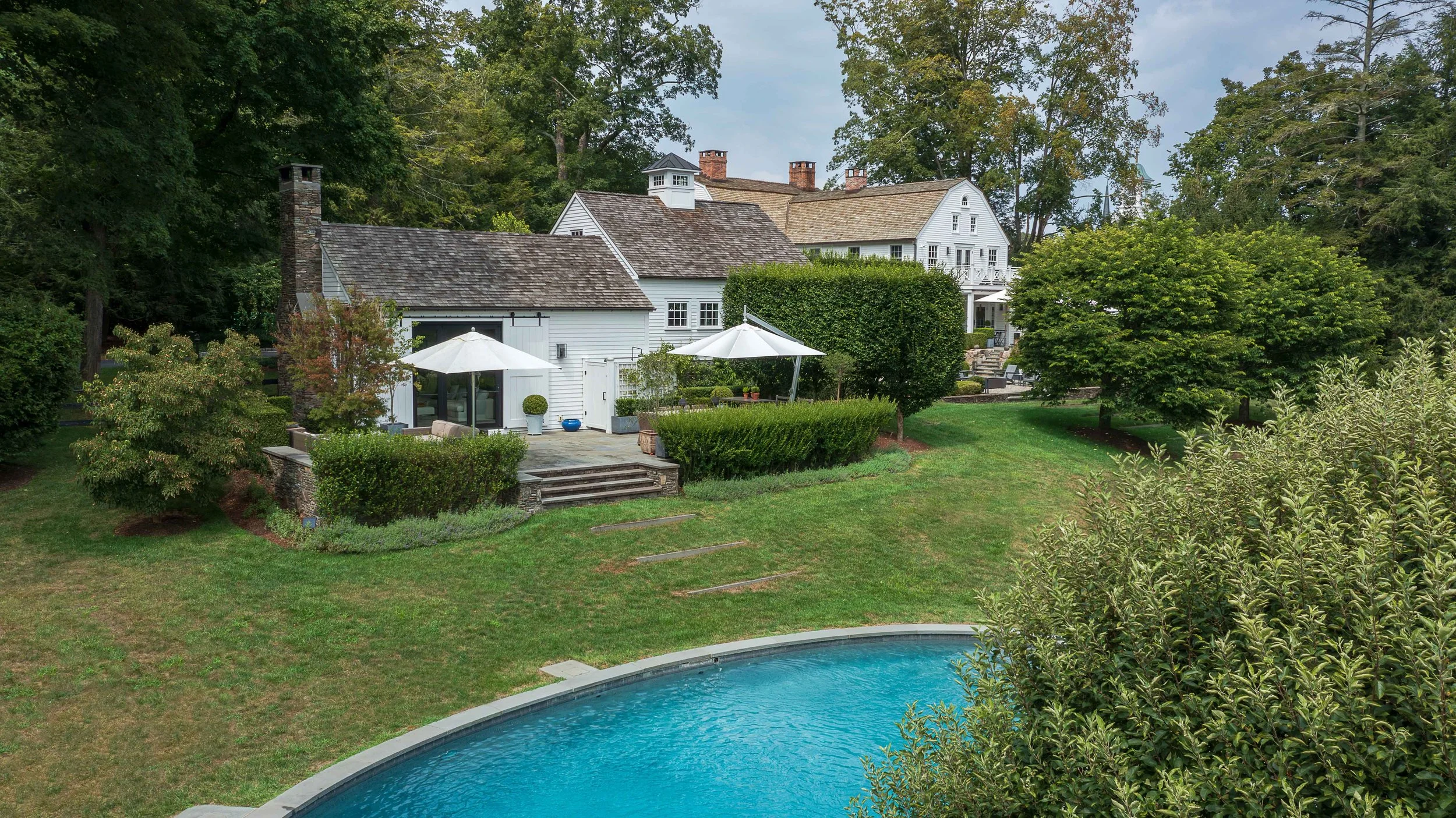 03-property-overview-pool-house-garage-grounds-bedford-ny.jpg