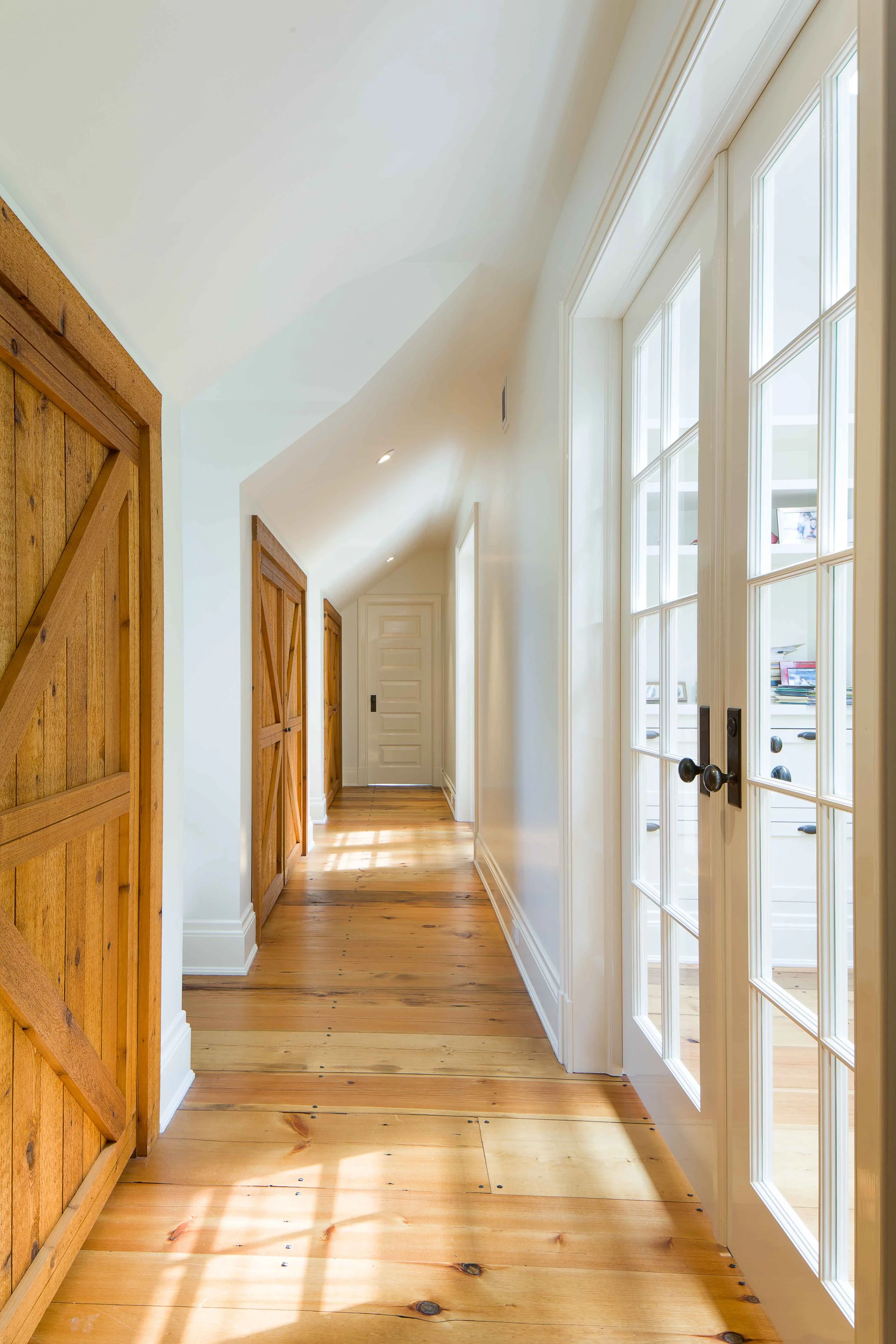 10-historic-home-hallway-natural-light-wood-floor.jpg