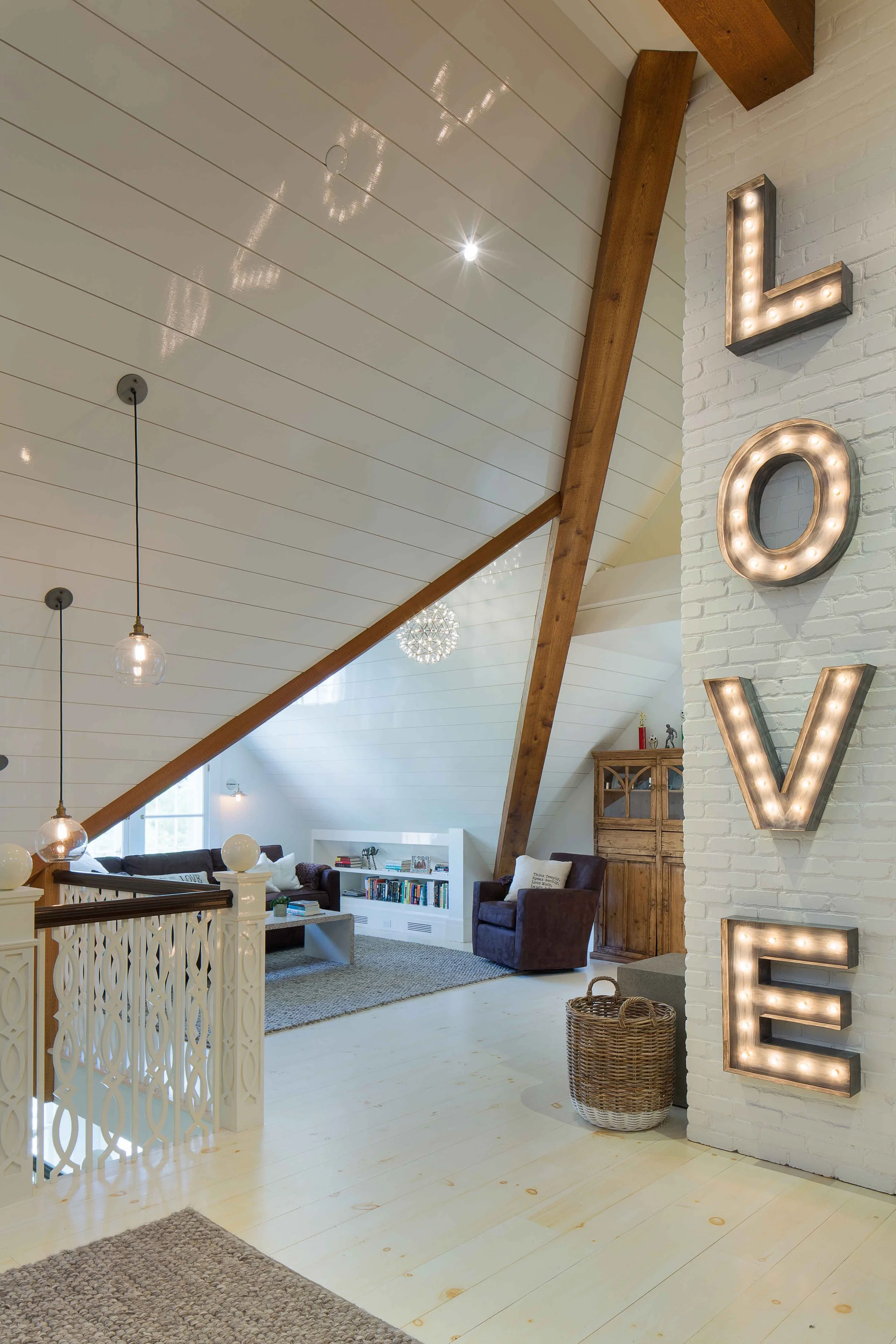 11-attic-lounge-exposed-beams-vaulted-ceiling.jpg