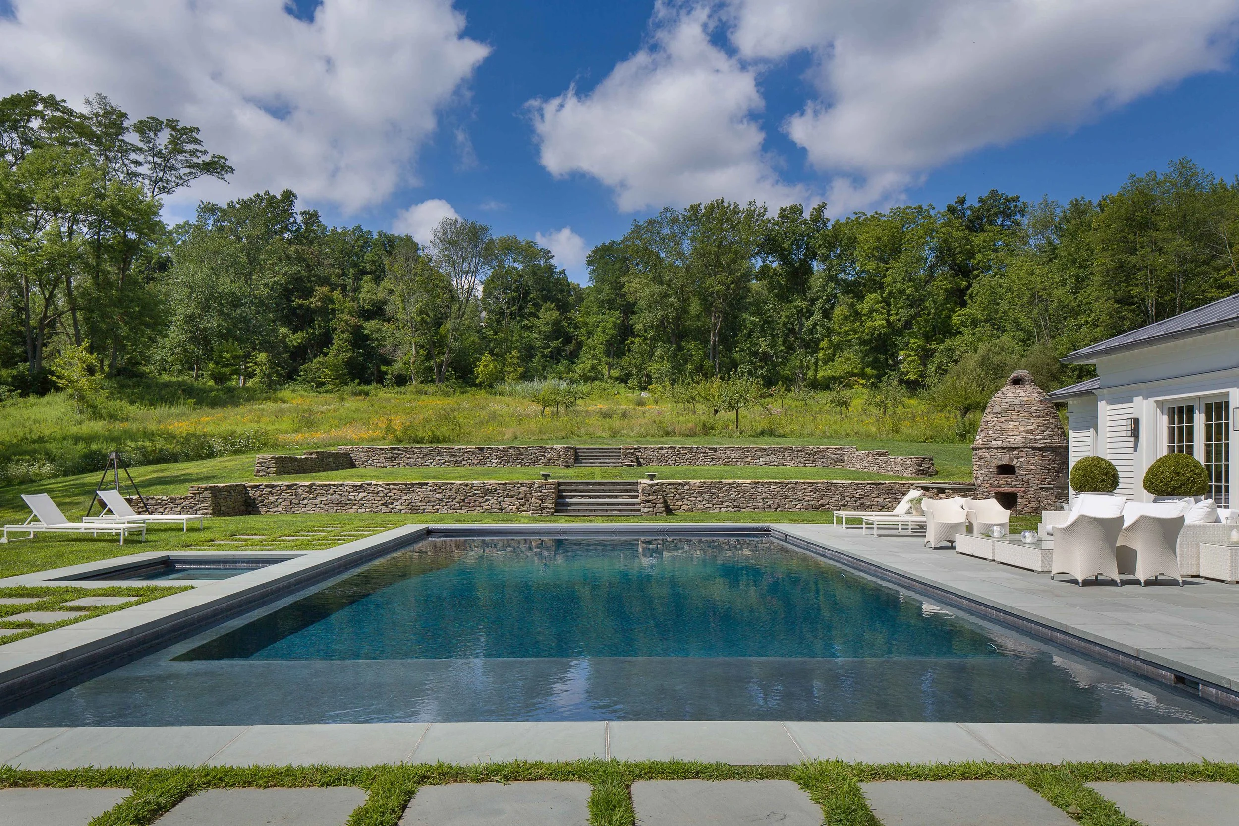 04-estate-pool-stone-wall-landscape.jpg