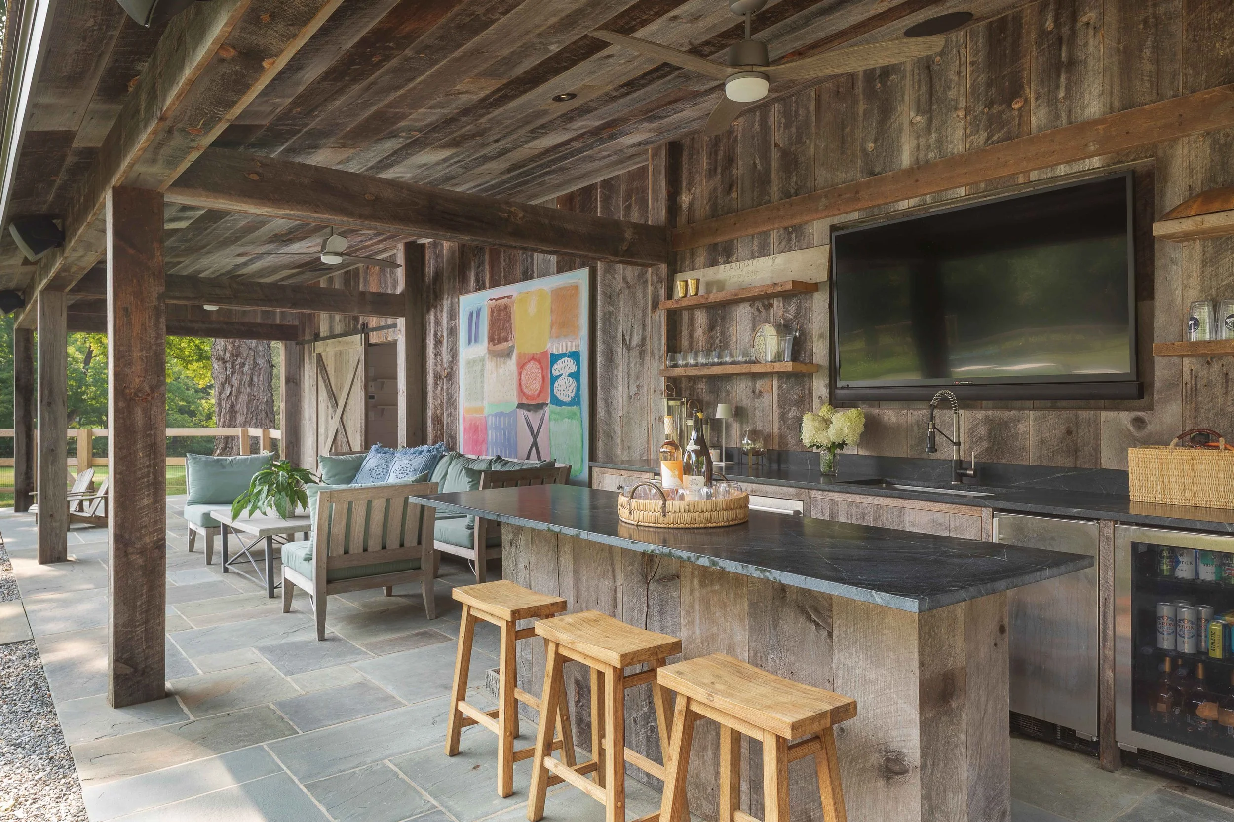 06-bedford-ny-historic-barn-renovation-outdoor-kitchen-covered-patio.jpg