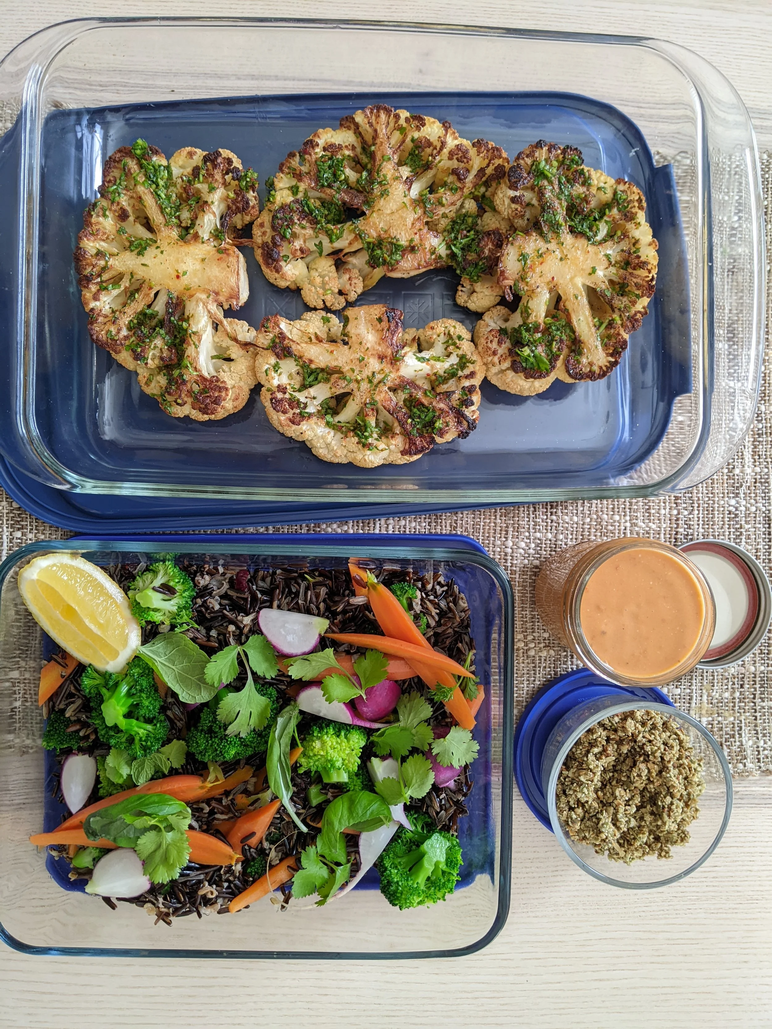 Rectangular containers with meals prepped for the future.