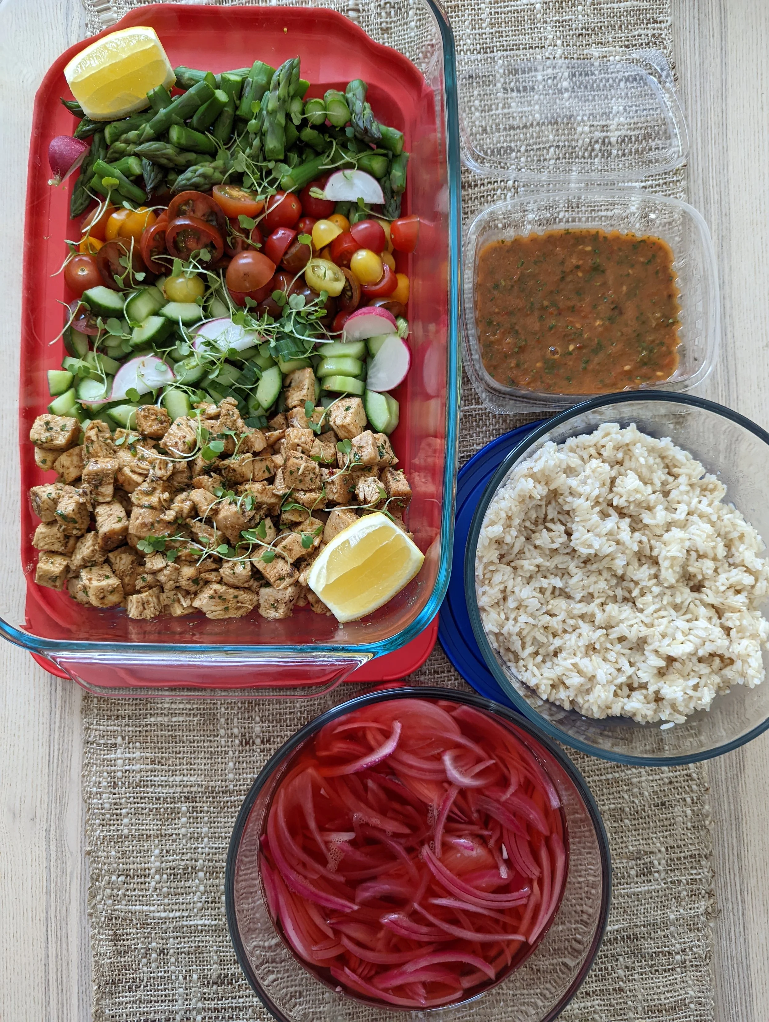 Rectangular containers with meals prepped for the future.