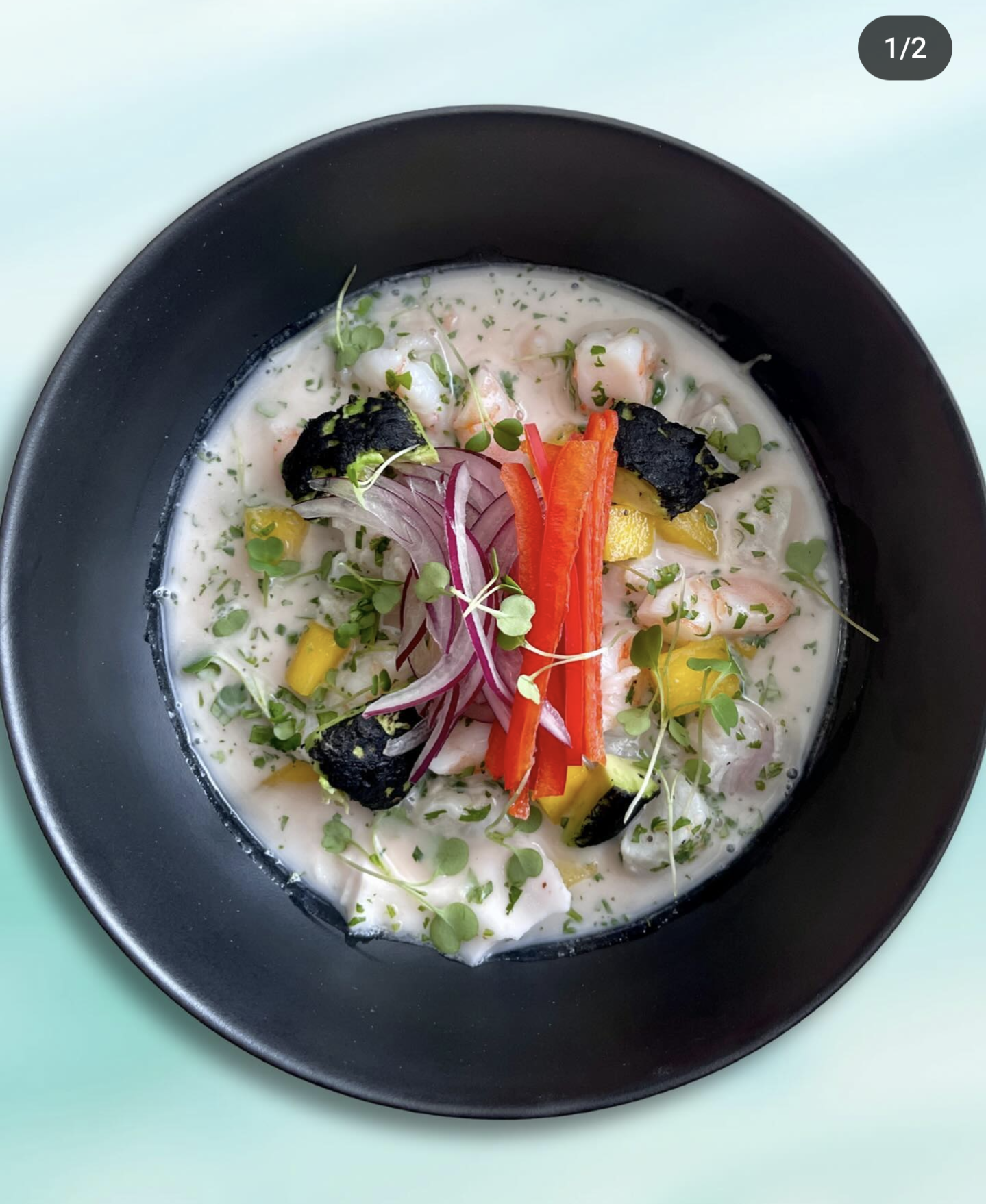 	
Tropical ceviche with fish and shrimp in a coconut sauce.