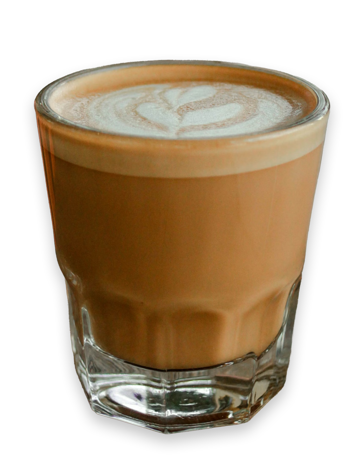 A glass of iced coffee topped with foamed milk on a black background.