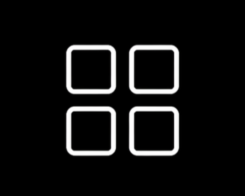 Four white square outlines arranged in a two-by-two grid on a black background.
