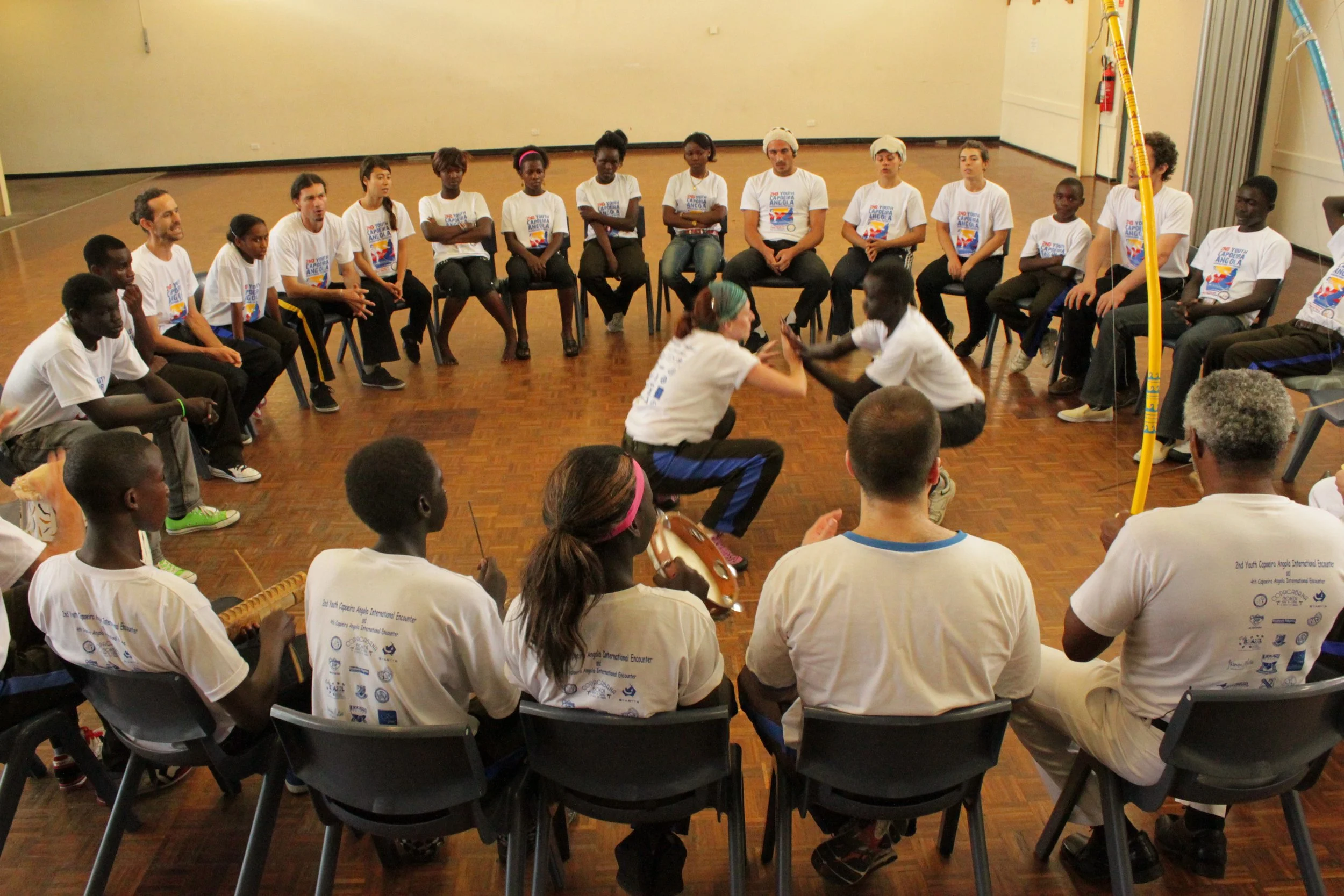 The Roda of Capoeira Angola. An Afro-Brazilian art form that combines music, movement and culture. Rooted in freedom, cooperation and joy.