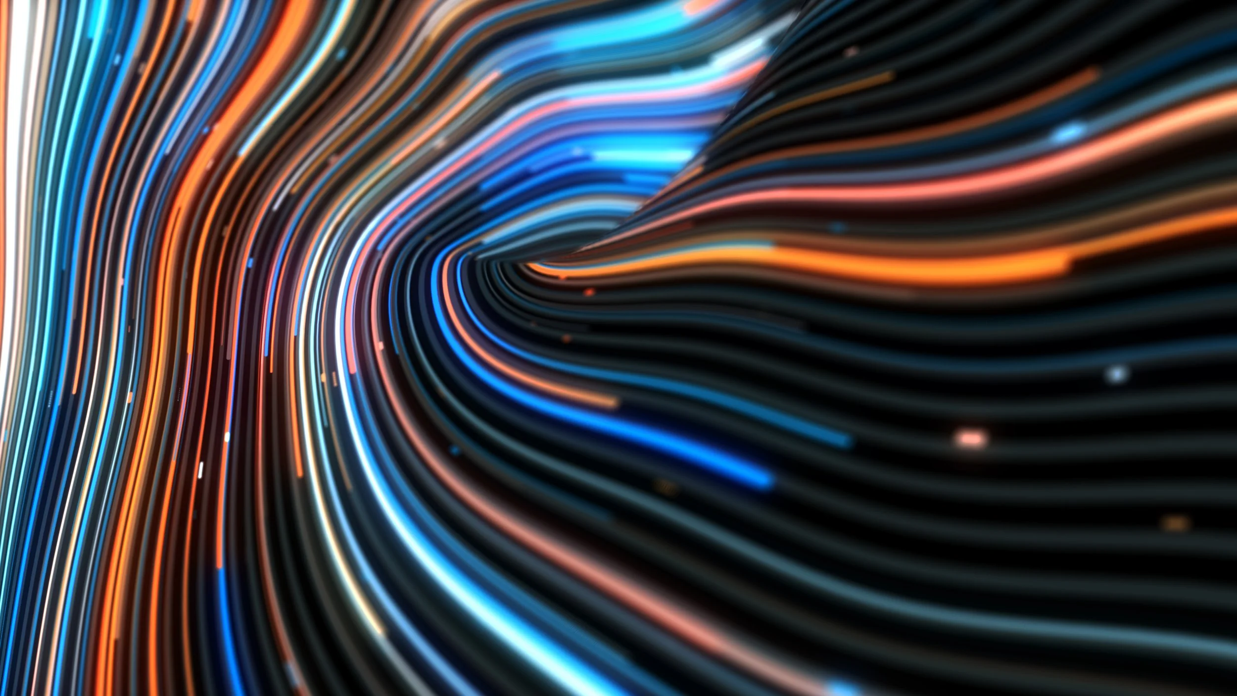Colorful streaks of light reflecting abstract ideas of data, technology and movement with bright, glowing lines in blue, orange, and white shades.
