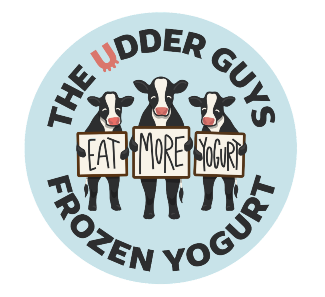 Three cartoon cows holding signs that say 'Eat', 'More', and 'Yogurt', with the text 'The Udder Guys' and 'Frozen Yogurt' around them.