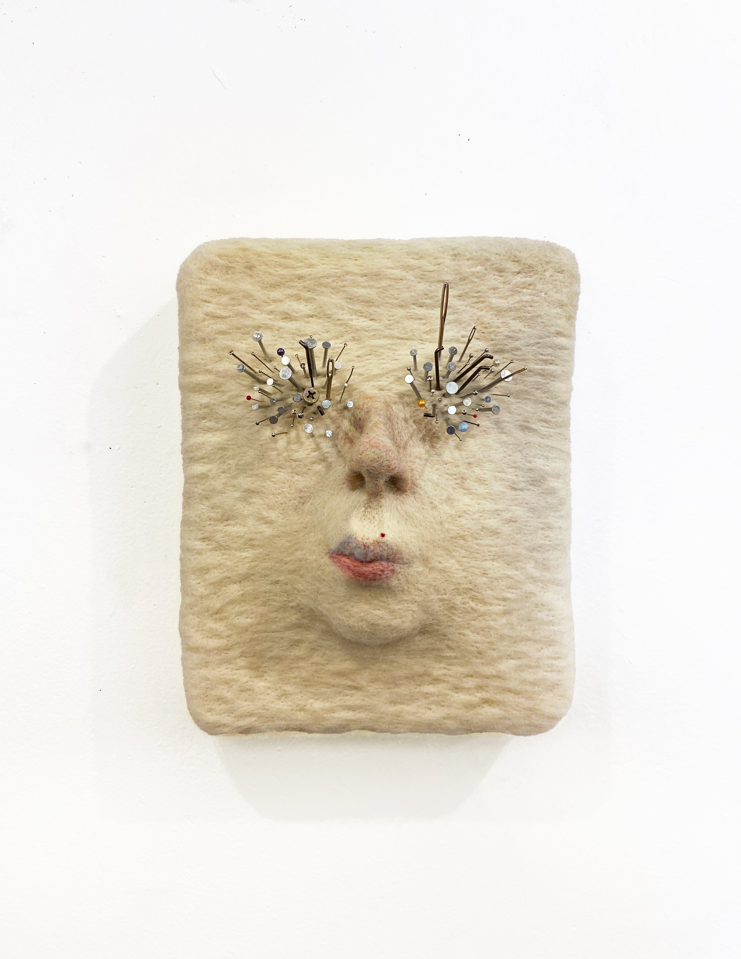 FELTED FACE