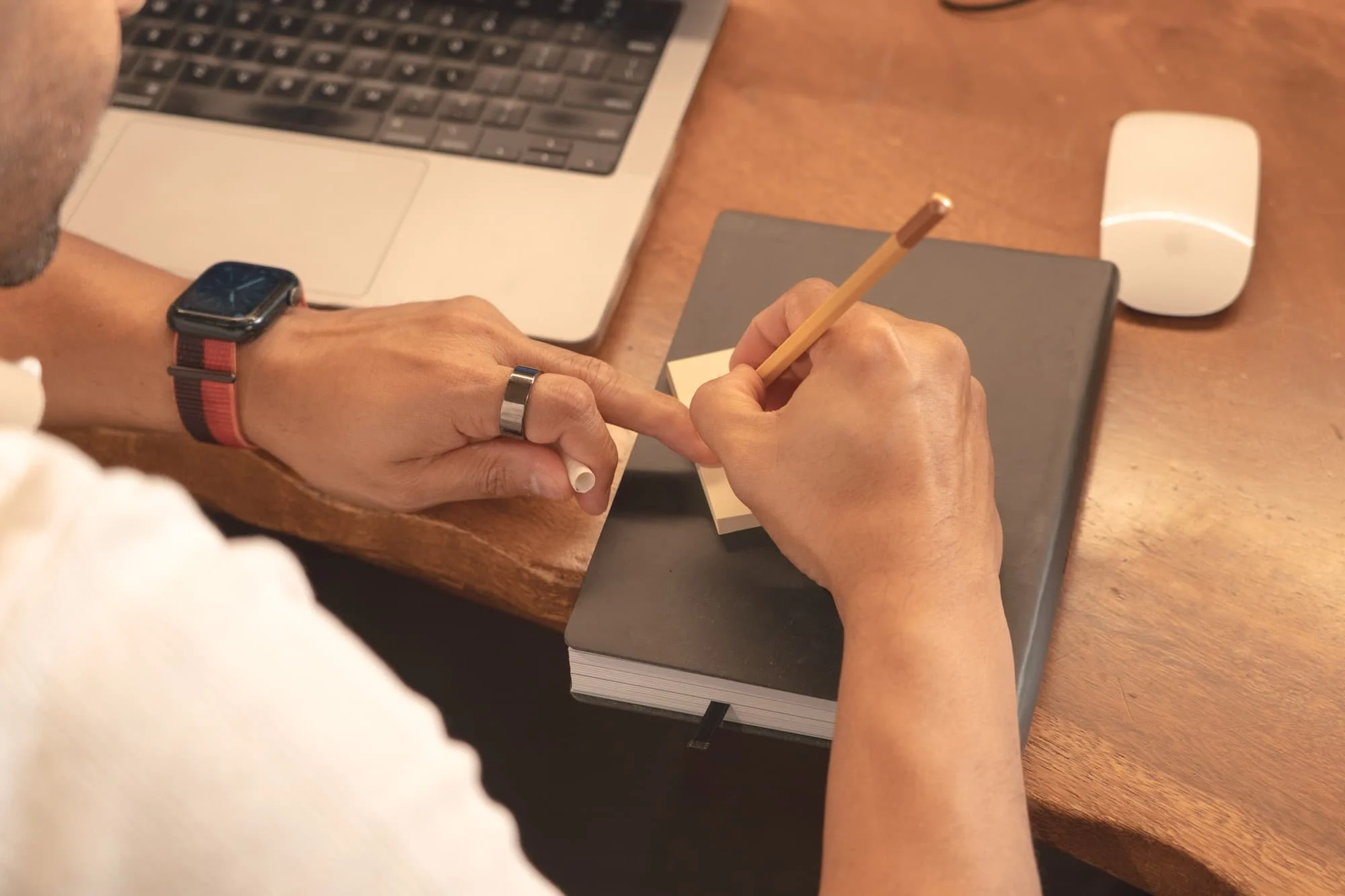 Rumit Kanakia taking notes during a life transition coaching session