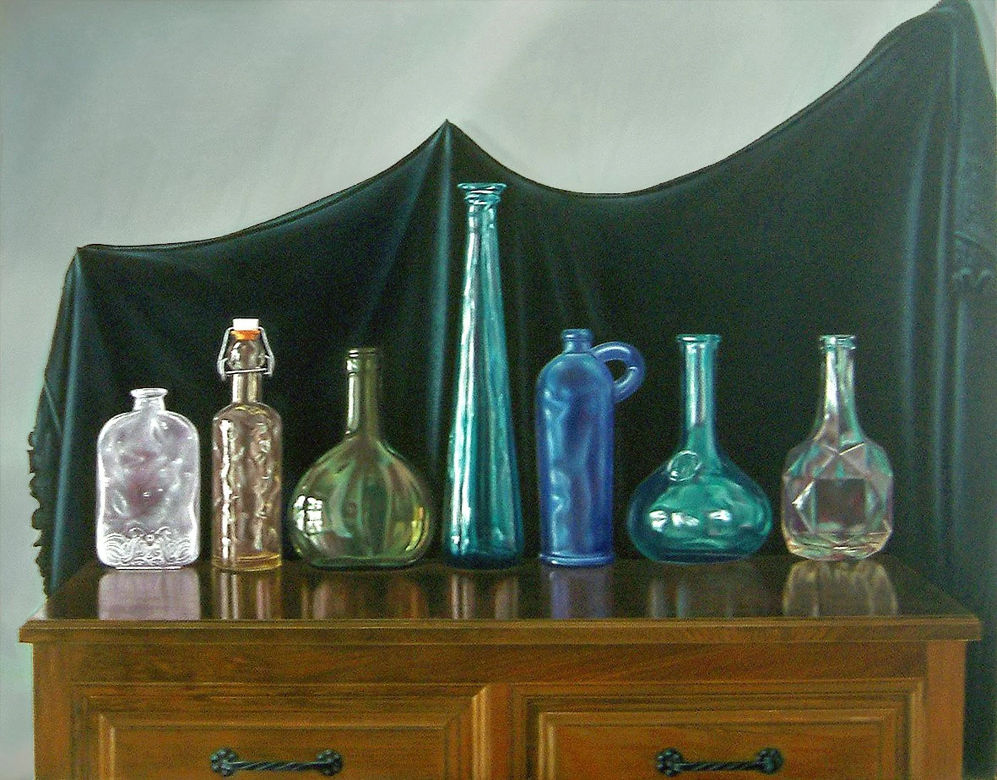 Botellas con Paño Negro.