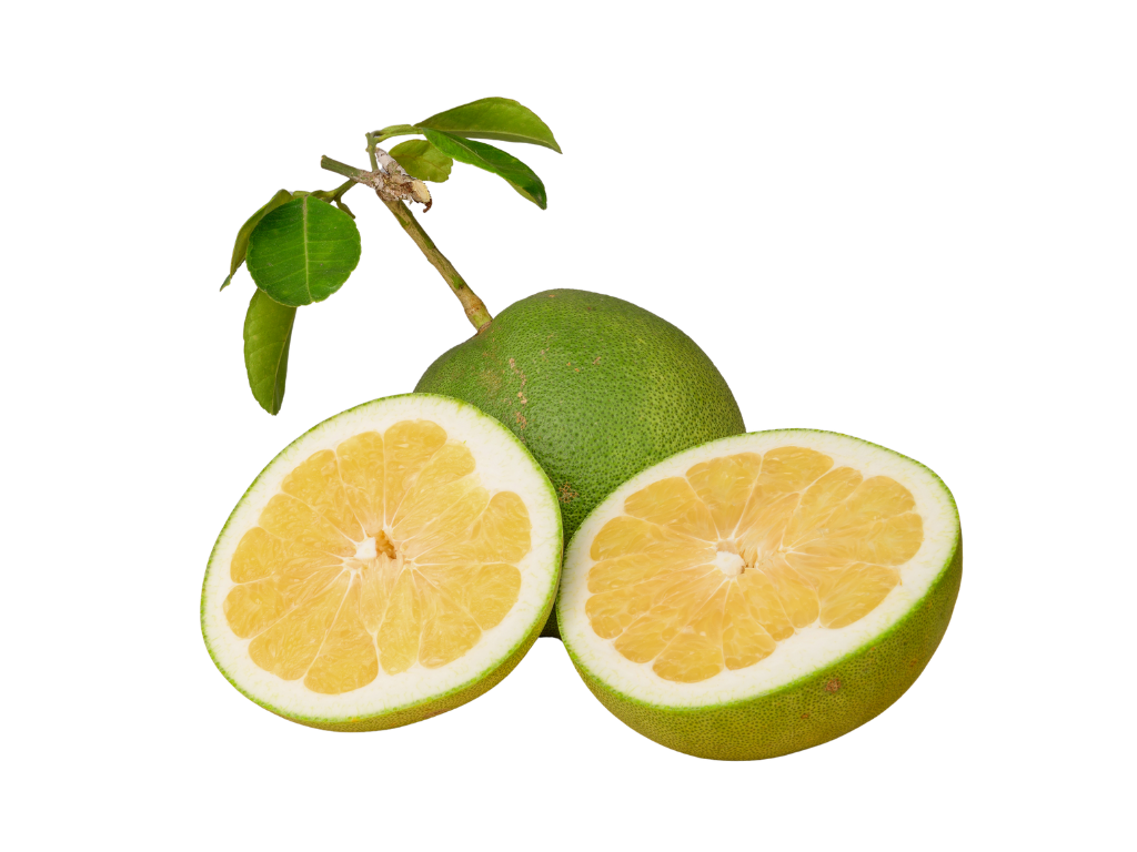 Whole bali pomelo with two halves showing yellow pulp and green rind, placed on a white background.