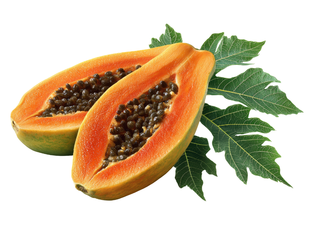 A sliced papaya with orange flesh and black seeds on green leaves.