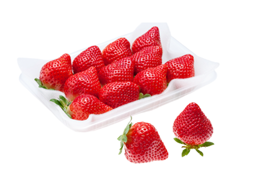 Fresh strawberries in a white container with a couple outside the container.