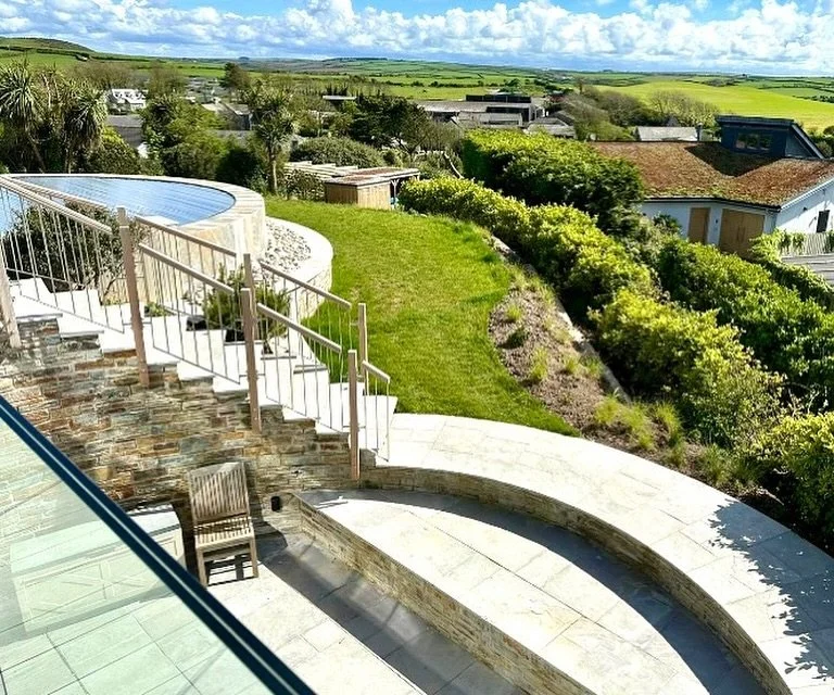 Lots of Curved paving work going on for this job for @harbour_construction who have done yet another beautiful home with this curved infinity pool edge overlooking the harbour. #landscaping #paving #construction #pool  #cornwall #rockcornwall