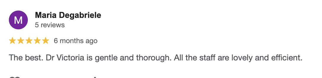 Customer review for Dr. Victoria from Maria Degrabile, five stars, praising her gentle and thorough care, and mentioning the friendly and efficient staff.