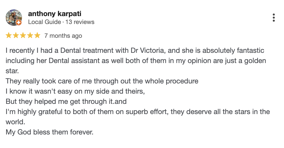 Screenshot of a positive review for Anthony Karpati, praising Dr. Victoria and her dental assistant for excellent care during a dental treatment.